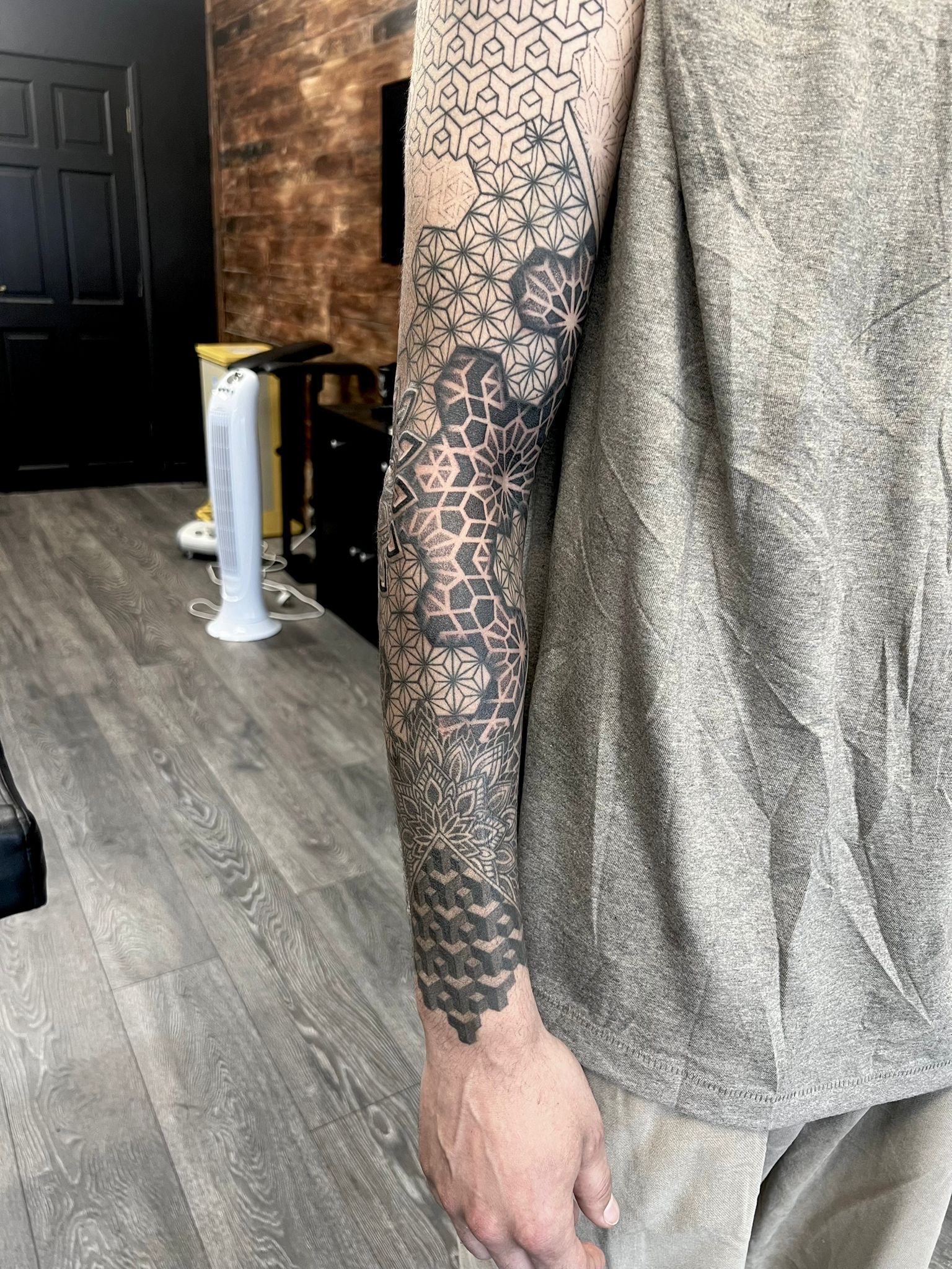Geometric full sleeve tattoo